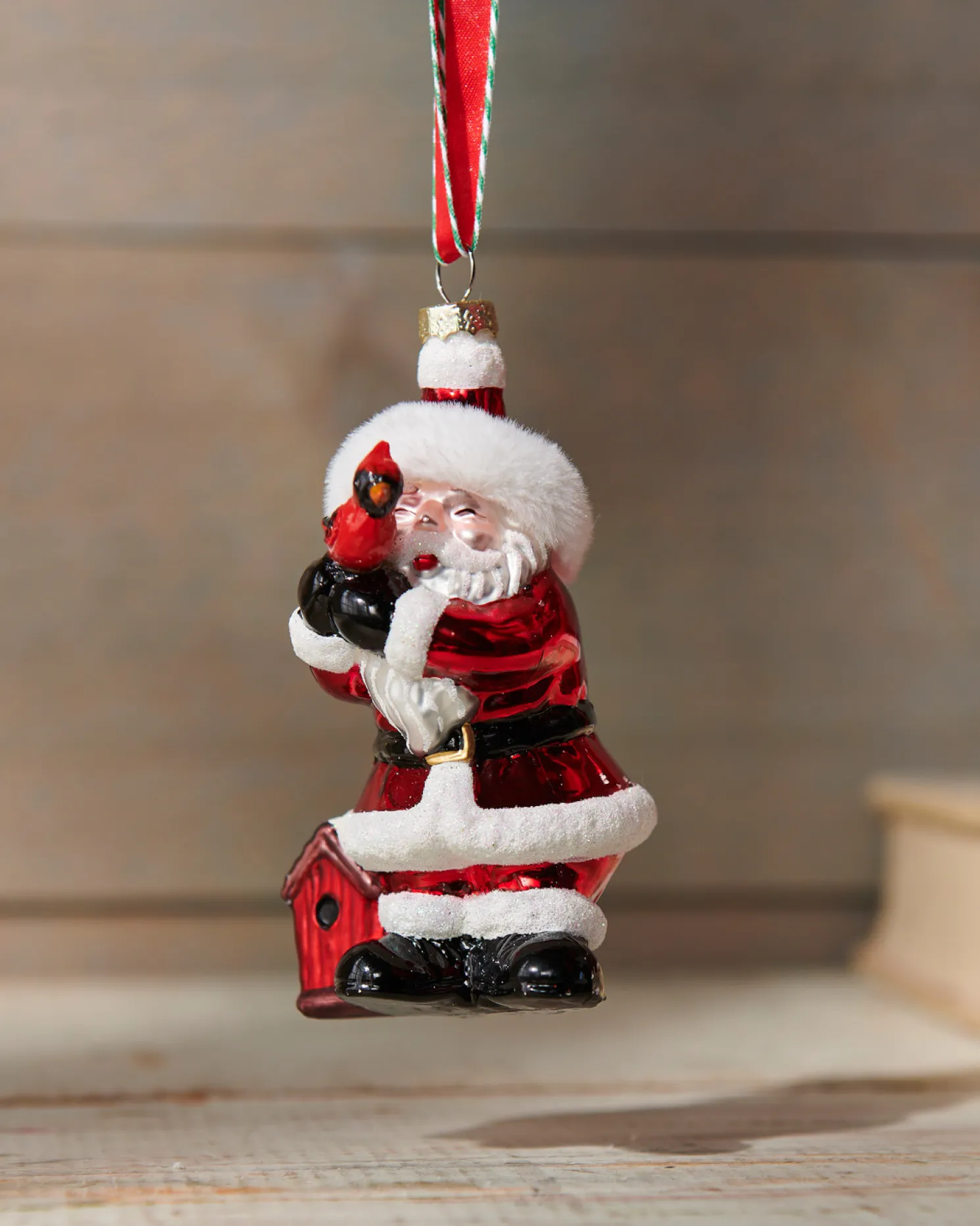 Raz 4" Santa Holding Cardinal Glass Christmas Ornament 4524940